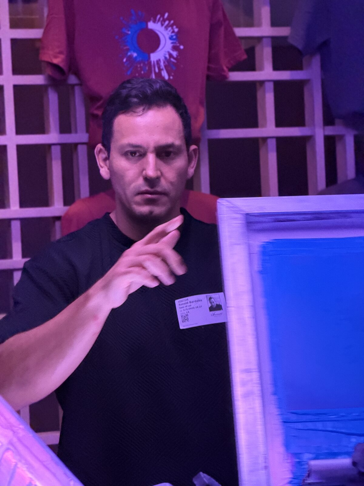 Live printing at an evening event with dramatic lighting